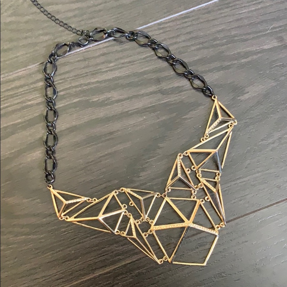 Gold and black cage necklace